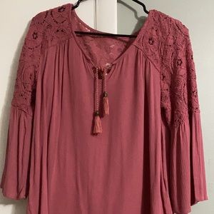 Long sleeve mauve shirt. Loose fit. Worn once